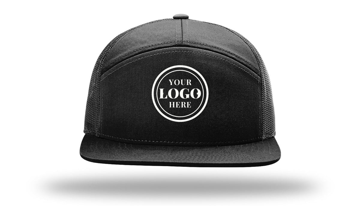 Richardson 168 seven-panel trucker cap, black, with 2.1 in embroidered logo placeholder