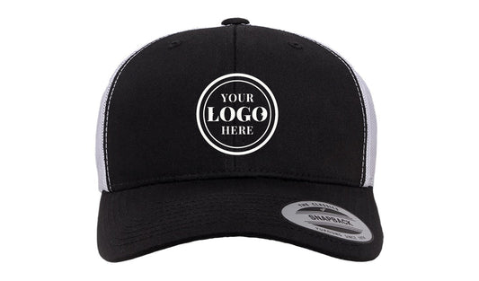 Yupoong 6606 retro trucker cap, black/white, with 2.1 in embroidered logo placeholder