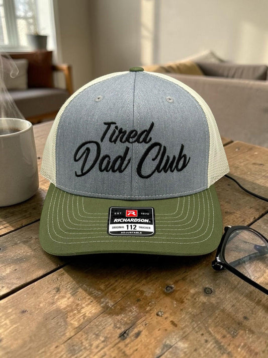 Blankslatecustoms Tired Dad Club Richardson 112 trucker hat with olive green brim, heather grey front, and mesh back.